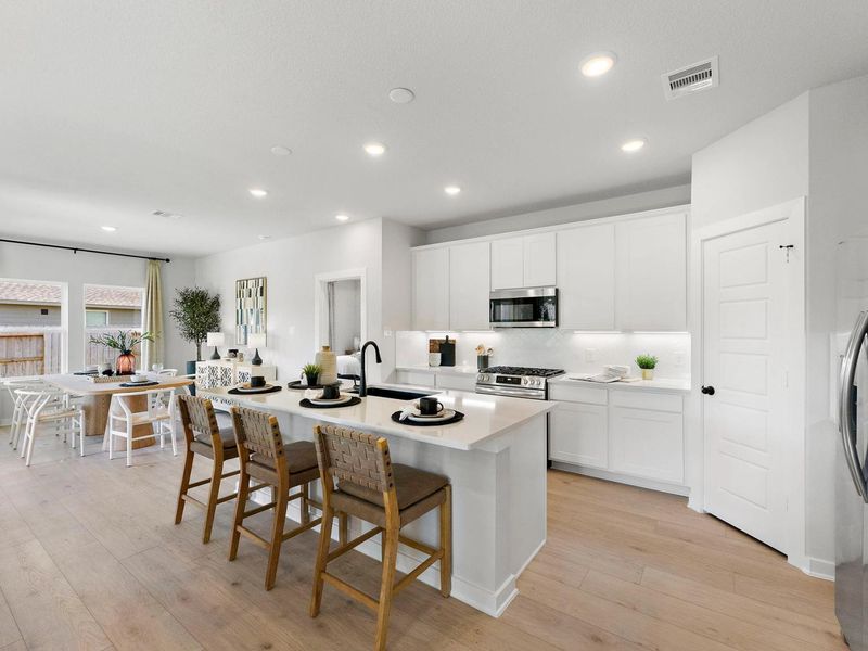 Furnished interior in a model home at Sundance Cove in Crosby (Image 6).