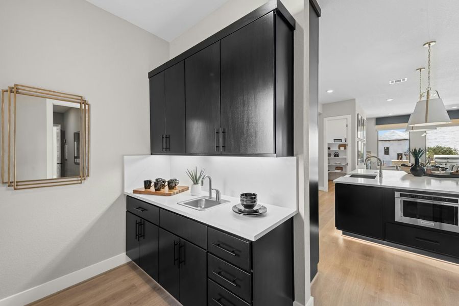 Furnished interior in a model home at Caliterra in Dripping Springs (Image 34).