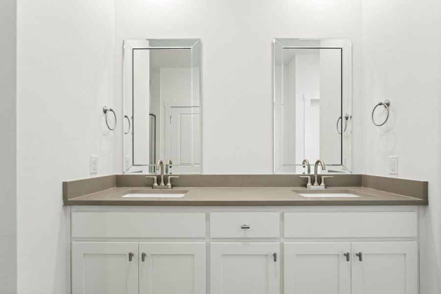 Furnished interior in a model home at Windsong Ranch Townhomes in Prosper (Image 32).