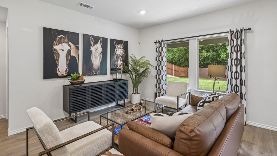 Furnished interior in a model home at Three Oaks in Sherman (Image 18).
