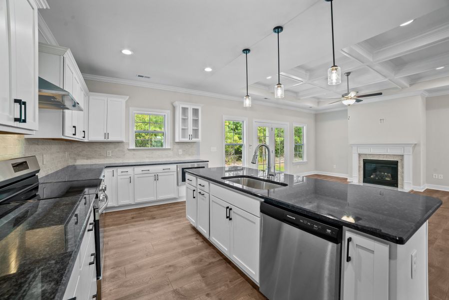 Furnished interior in a model home at The Villas at Langston Farms in Winterville (Image 4).