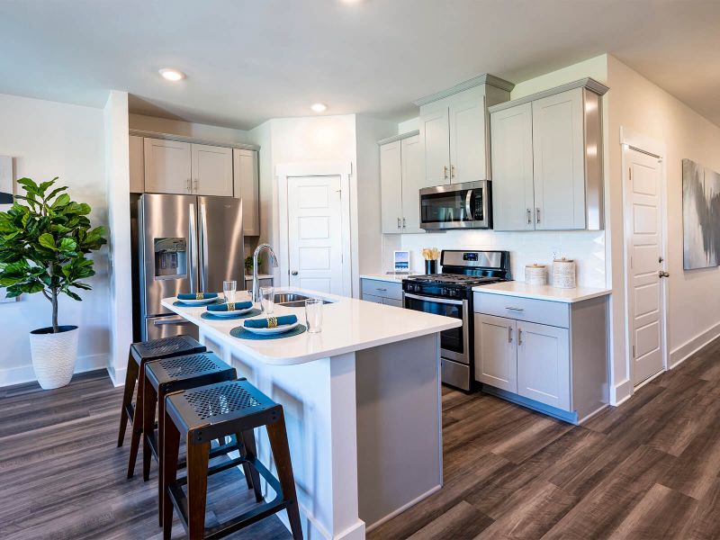 Prep dinner in the kitchen for guests. Photography from Townes at Garrison Grove. Prep dinner in the kitchen for guests. Photography from Townes at Garrison Grove.
