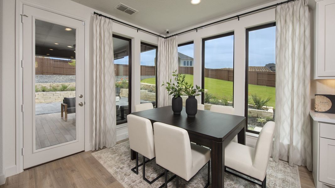 Furnished interior in a model home at Homestead 55' in Schertz (Image 10).