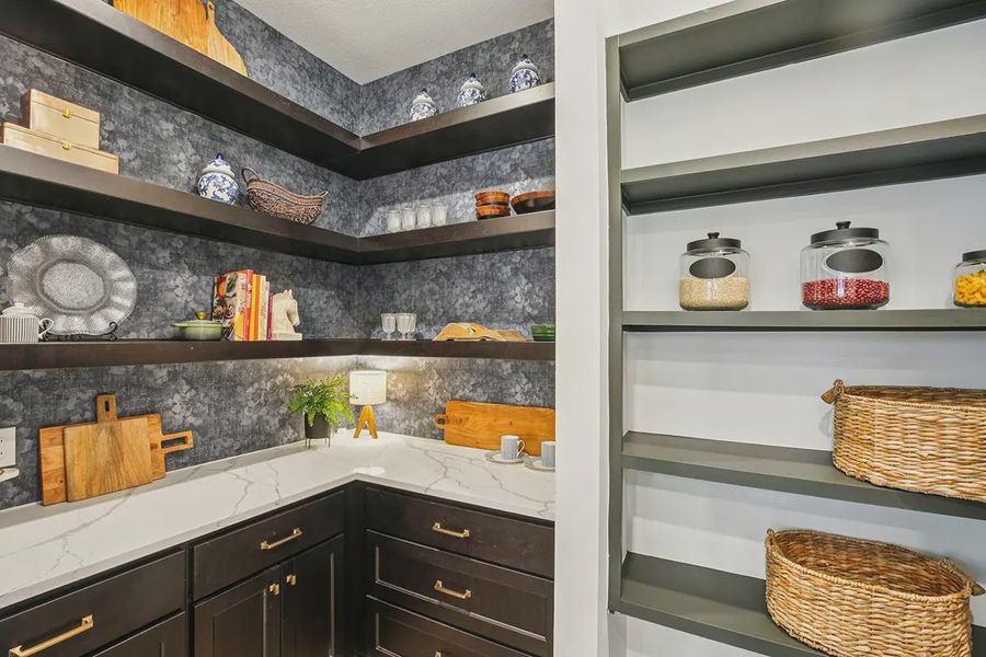 Furnished interior in a model home at Meridiana 50's in Manvel (Image 33).
