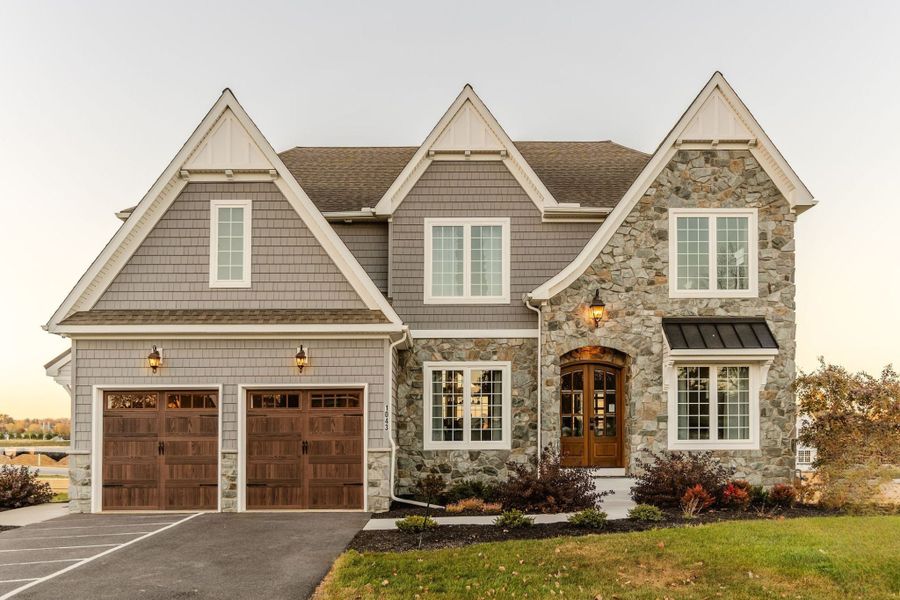 Front exterior of a home in the Preserve at Mayes Meadow community, located in Cornelius, NC (Image 4).