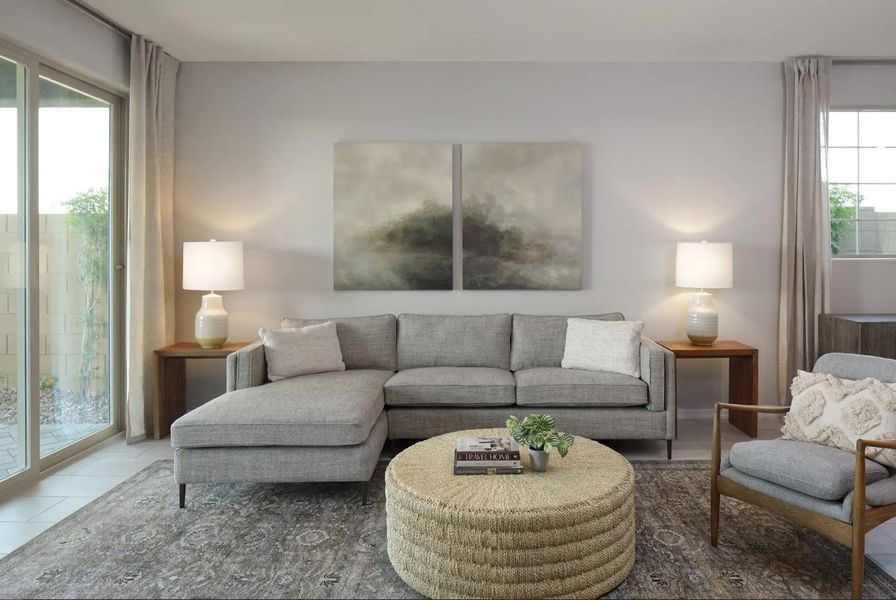 Furnished interior in a model home at Amarillo Creek in Maricopa (Image 14).