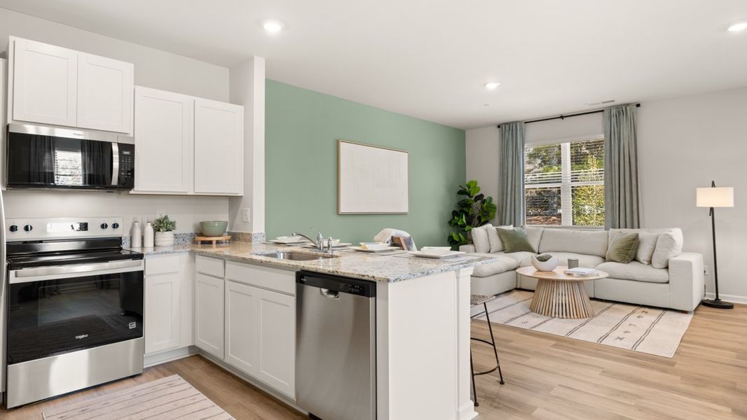 Furnished interior in a model home at Roseleigh Park in Douglasville (Image 4).