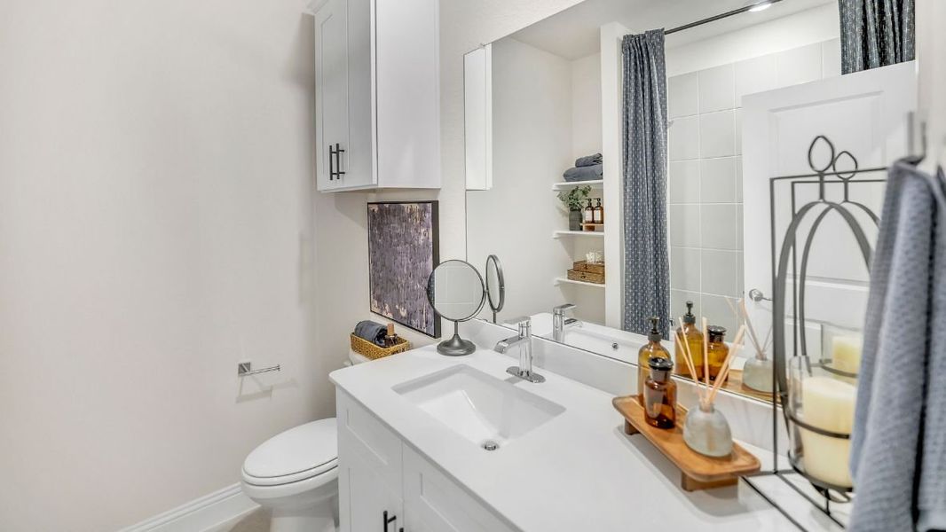 Furnished interior in a model home at The Avenue in Allen (Image 24).