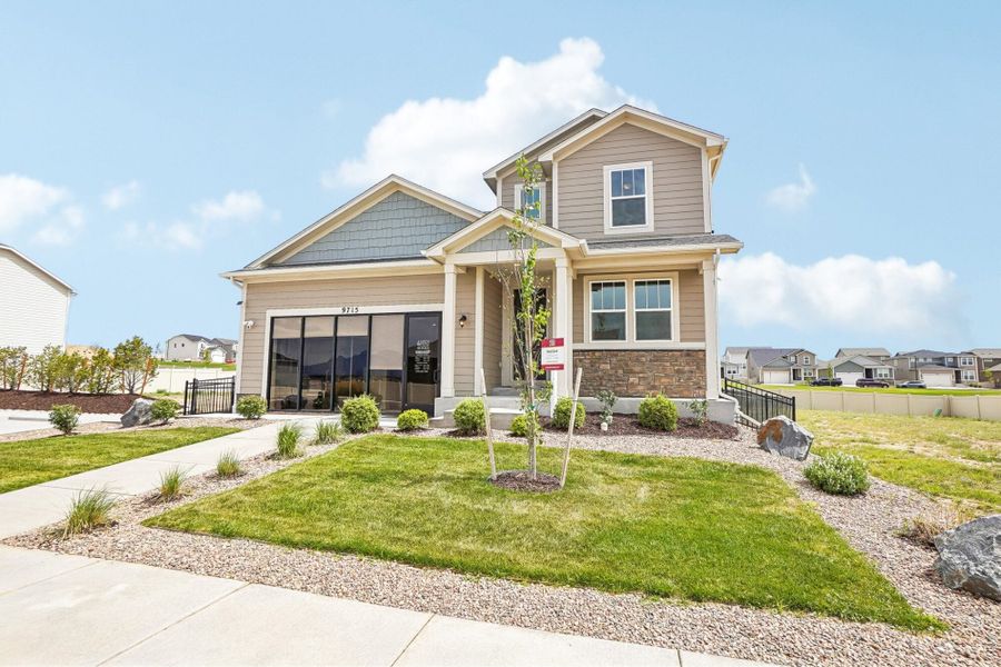Front exterior of a home in the Aspen Ranch community, located in Fountain, CO (Image 10).