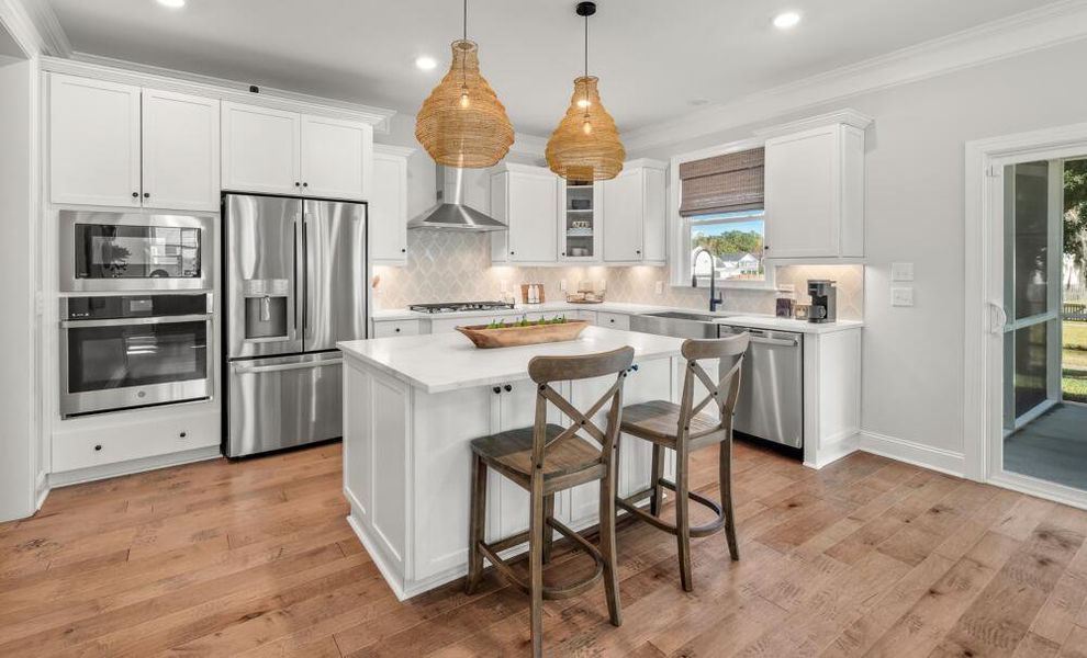 Furnished interior in a model home at Enclave at Riverdale in Huntersville (Image 4).