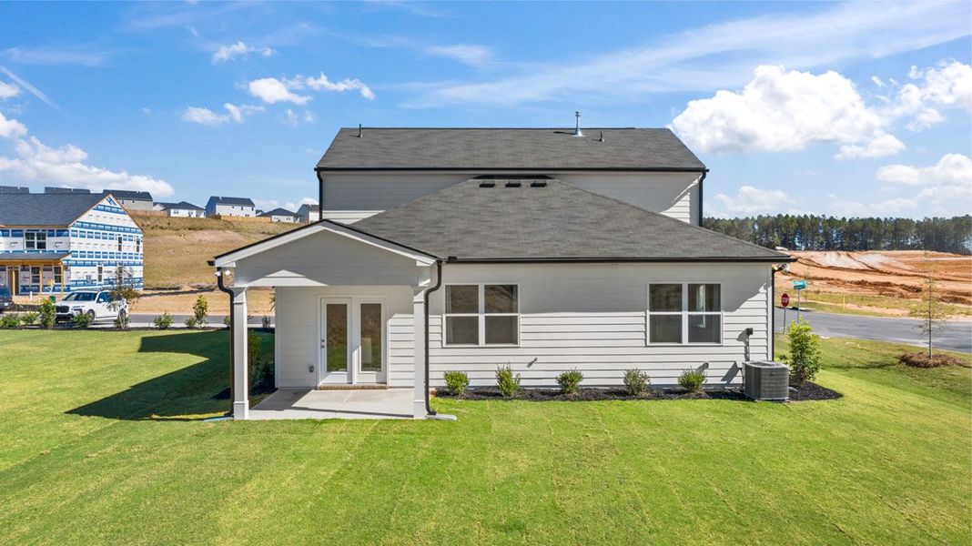 Front exterior of a home in the The Abbey at Trolley Run Station community, located in Aiken, SC (Image 8).