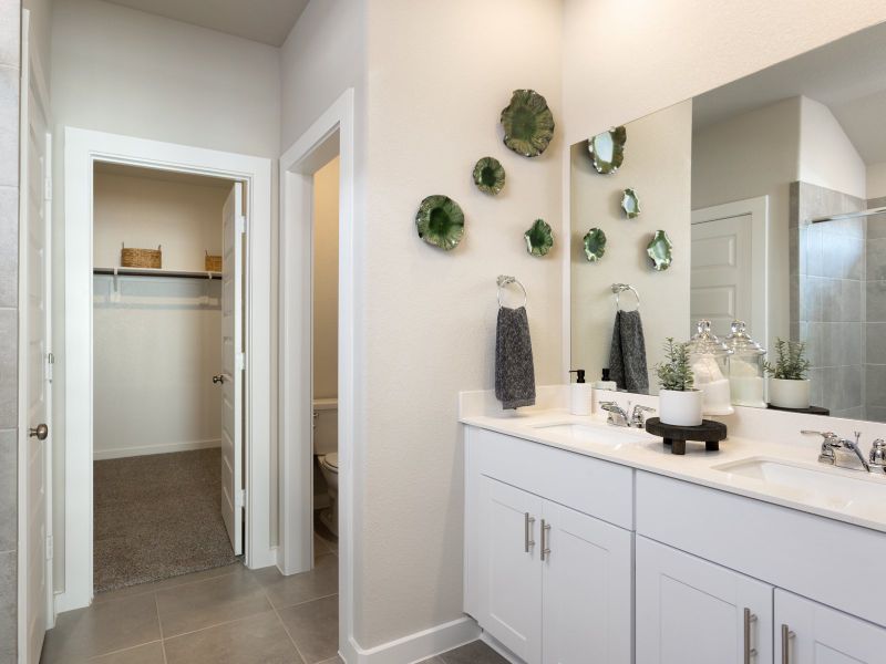 Relax in your tranquil primary bathroom.