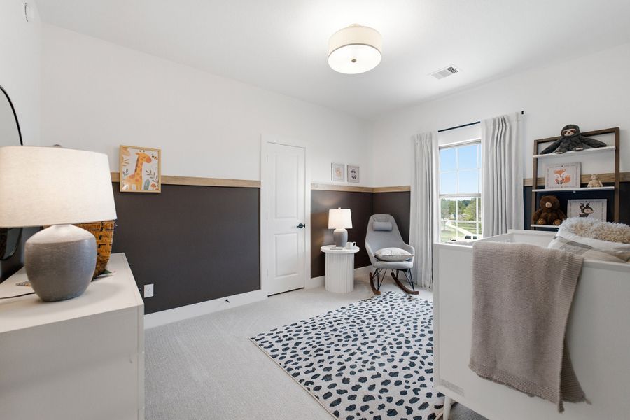 Furnished interior in a model home at Grand Magnolia in Waller (Image 38).