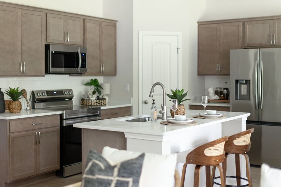 Furnished interior in a model home at Sweetwater in Brunswick (Image 7).