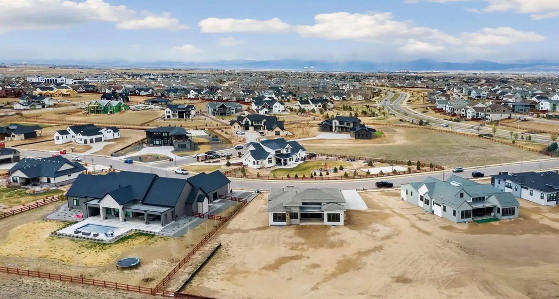 Aerial view of the Acadia at RainDance community in Windsor, CO, showing layout and nearby surroundings (Image 1).