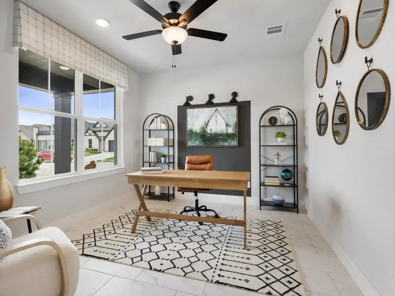 Furnished interior in a model home at Mercer Meadows in Royse City (Image 2).