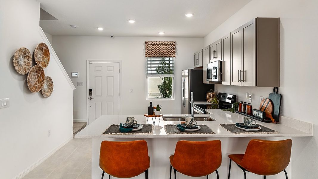 Furnished interior in a model home at The Townhomes at Skye Ranch in Sarasota (Image 29).