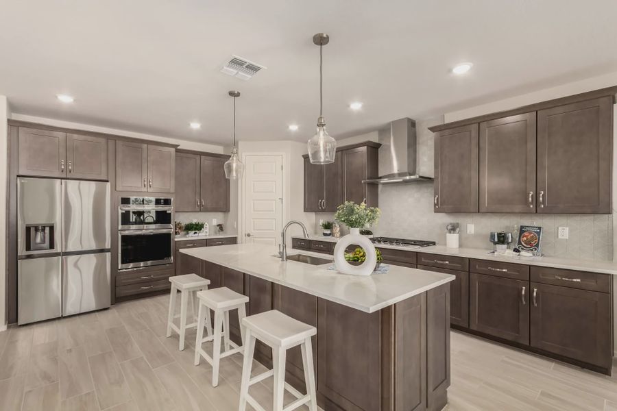 Furnished interior in a model home at Agave Springs at Teravalis in Buckeye (Image 11).