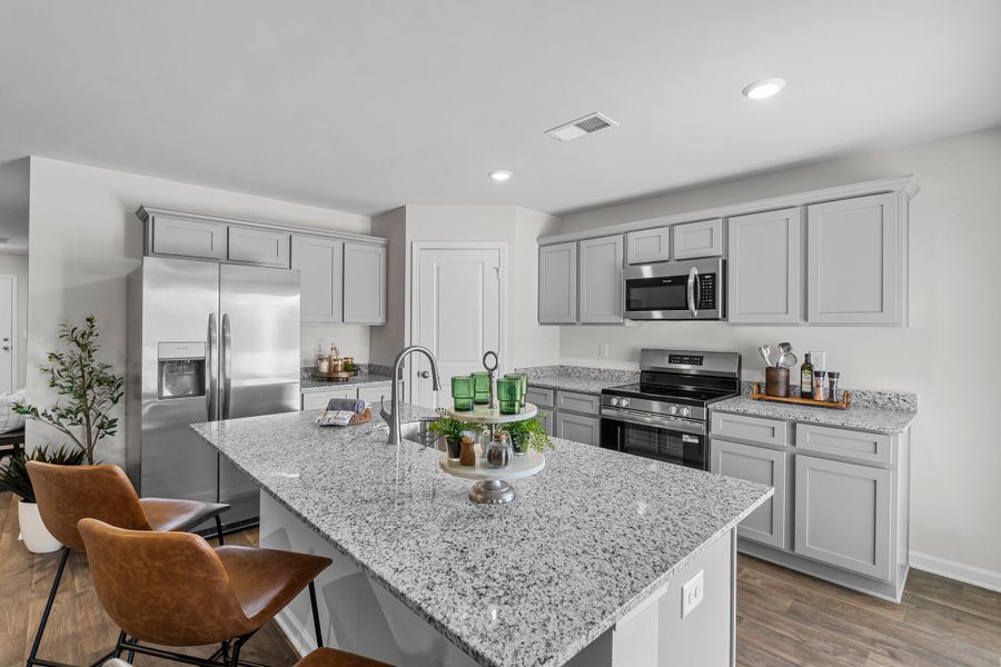 Furnished interior in a model home at Reserve at Mill Creek in Columbia (Image 8).