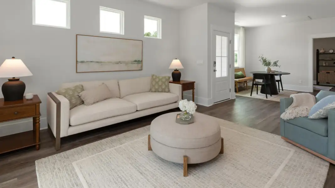 Furnished interior in a model home at The Retreat at Indigo Preserve Townhomes in Leland (Image 27).