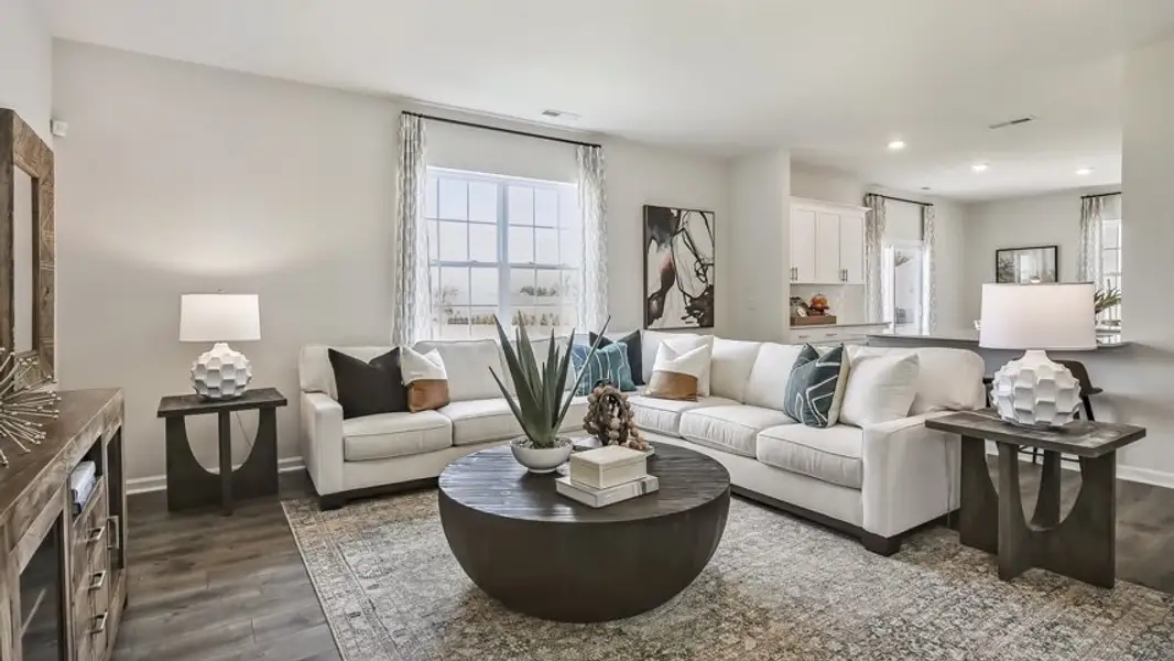 Furnished interior in a model home at The Reserve at Prestleigh in Wake Forest (Image 36).