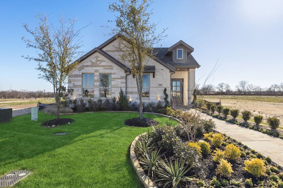 Front exterior of a home in the Redden Farms – Active Adult community, located in Midlothian, TX (Image 1). Front exterior of a home in the Redden Farms – Active Adult community, located in Midlothian, TX (Image 1).