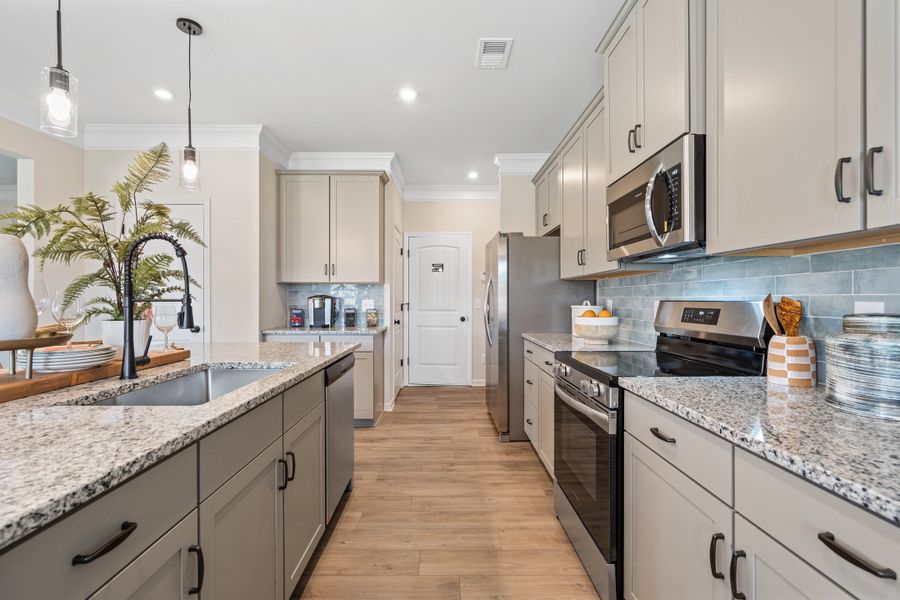 Furnished interior in a model home at Vandiver Creek in South Fulton (Image 47).