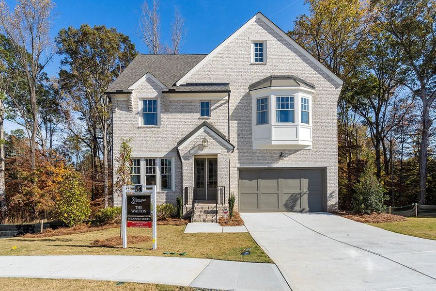 Front exterior of a home in the Enclave On Lavista community, located in Tyrone, GA (Image 2).