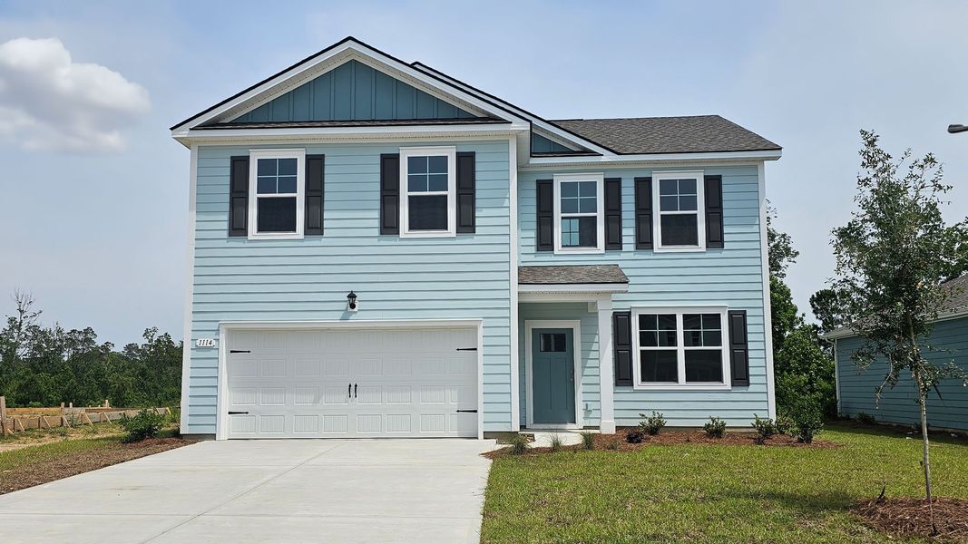 Front exterior of a home in the Kingston Bay community, located in Conway, SC (Image 8).