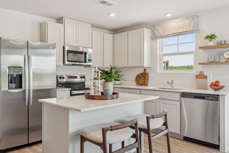 Enjoy designer-inspired kitchens with large center islands
