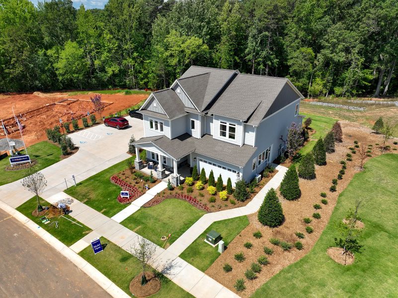 Aerial view of the The Reserve at Cadia Village community in Matthews, NC, showing layout and nearby surroundings (Image 1). Aerial view of the The Reserve at Cadia Village community in Matthews, NC, showing layout and nearby surroundings (Image 1).
