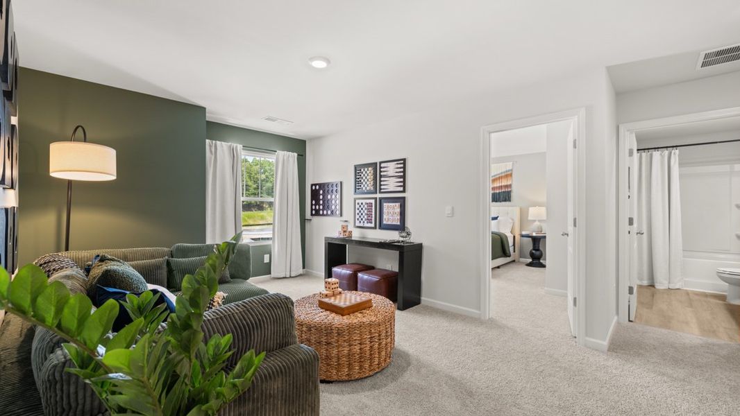 Furnished interior in a model home at Northwoods at Mirror Lake in Villa Rica (Image 24).