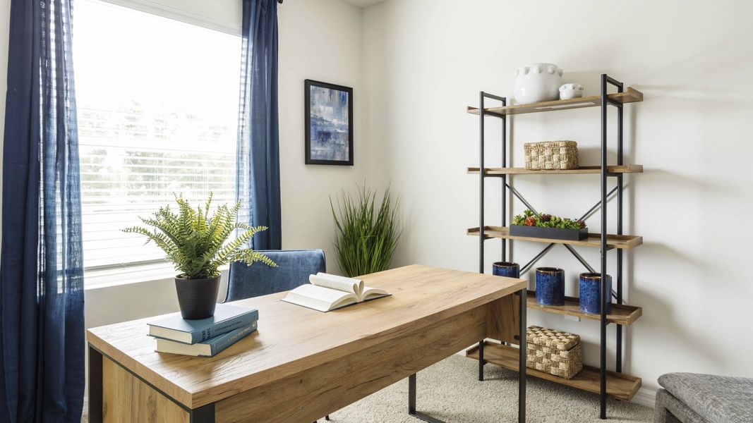 Furnished interior in a model home at Village Oaks in Clearwater (Image 15).
