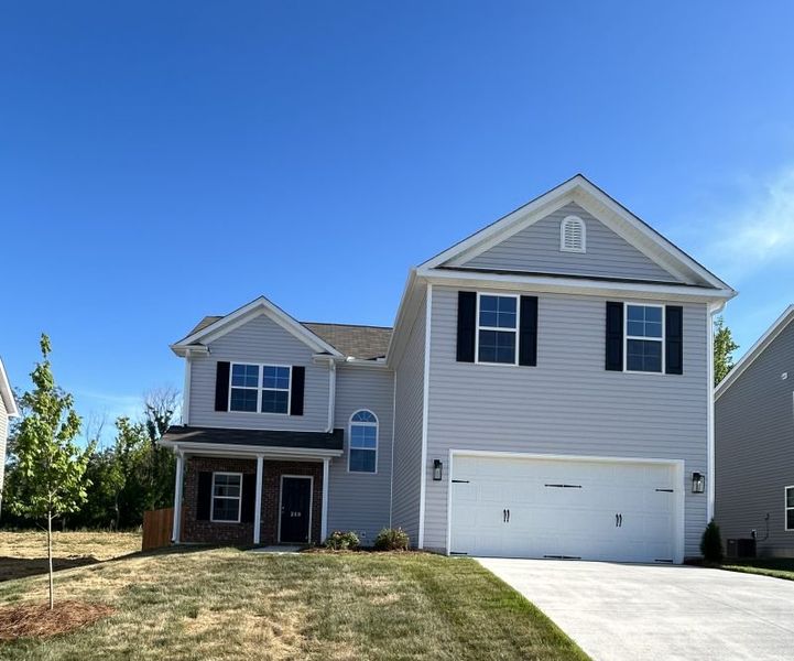 Front exterior of a home in the Brassfield Meadows community, located in Burlington, NC (Image 15).