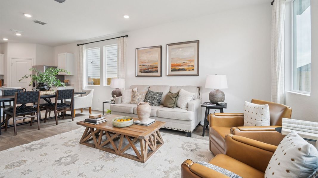 Furnished interior in a model home at Valverde in Bastrop (Image 5).
