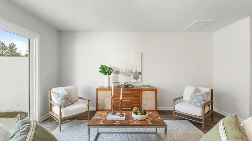 Furnished interior in a model home at Old Bailey Towns in Ridgeland (Image 11).
