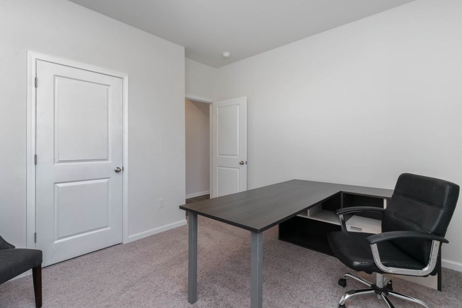 Furnished interior in a model home at Island Green in Myrtle Beach (Image 36).