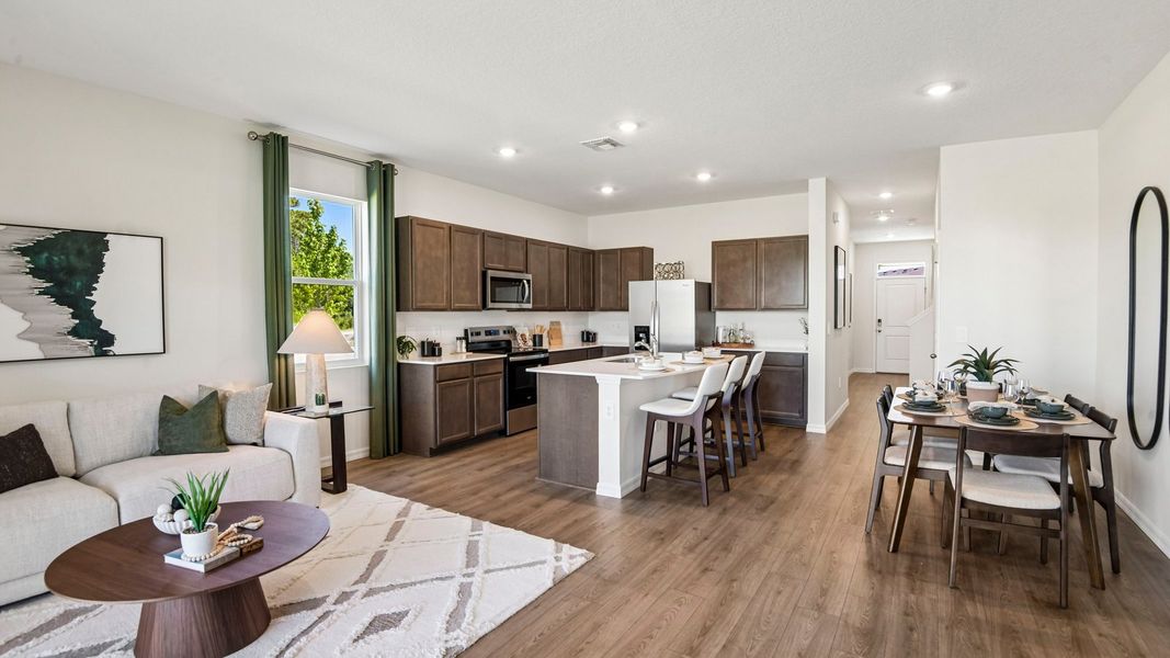 Furnished interior in a model home at Sanctuary at Citrus Park Townhomes in Tampa (Image 5).