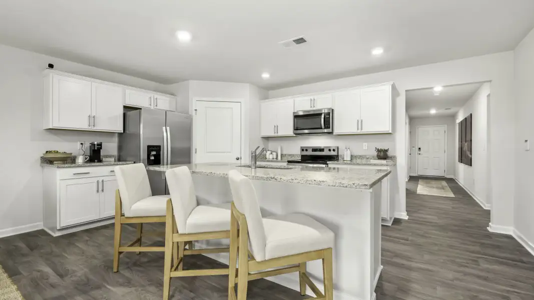 Furnished interior in a model home at Parker Trace in Mocksville (Image 10).