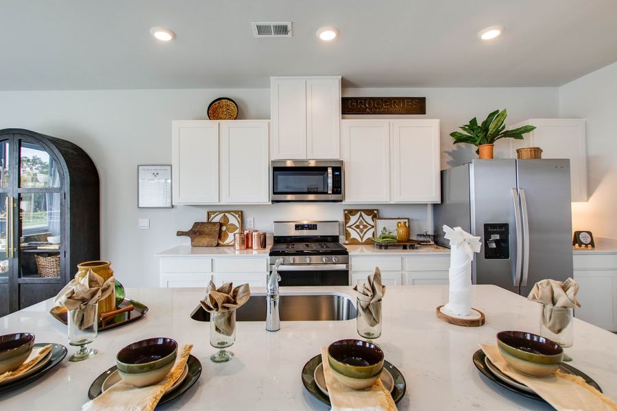 Furnished interior in a model home at Nexus North in Gallatin (Image 15).