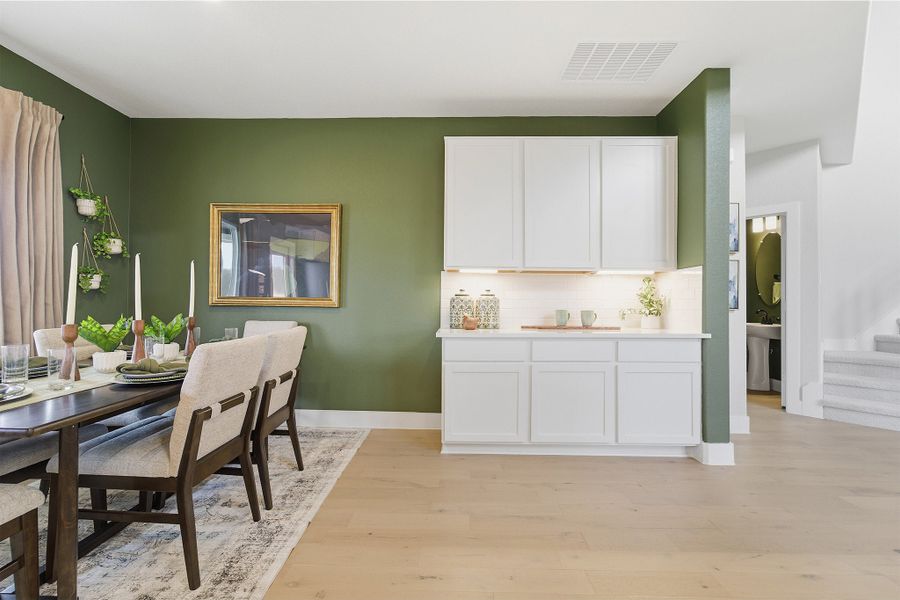 Furnished interior in a model home at Infinity Square in Kyle (Image 7).