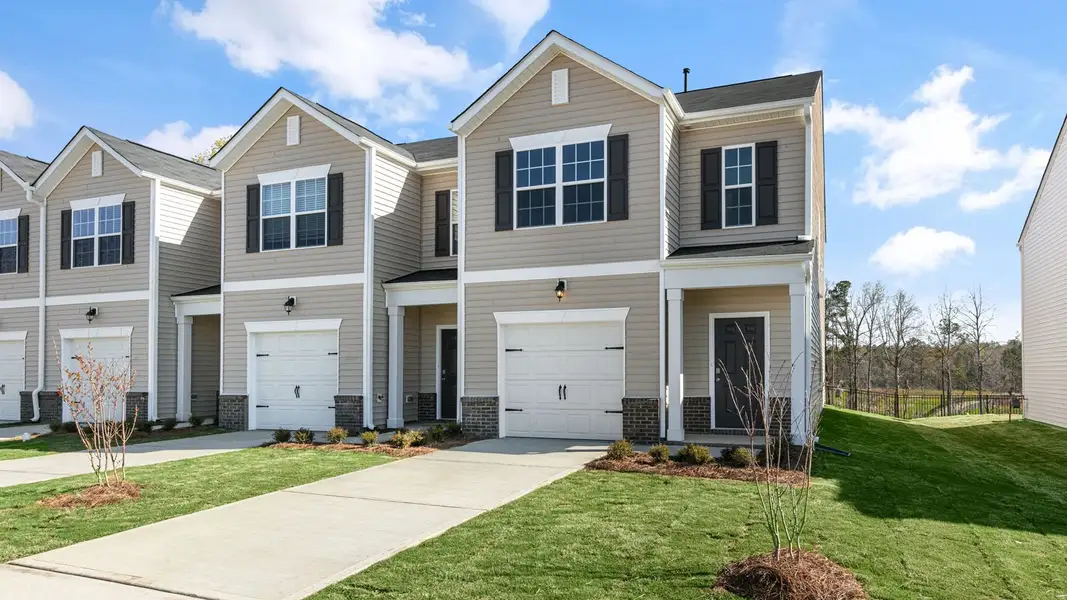 Front exterior of a home in the The Townes at Brookhaven community, located in Greensboro, NC (Image 1).