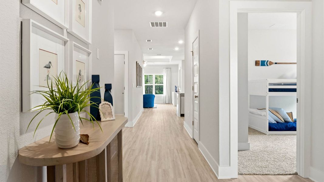 Furnished interior in a model home at Buffer Farms in Port Saint Joe (Image 6).