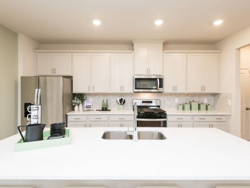 Furnished interior in a model home at Marshburn Landing - Bungalow Series in Wendell (Image 3).