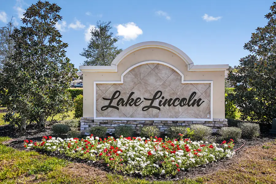 Entrance to the Lake Lincoln community in Eustis, FL, featuring signage and landscaping (Image 2). Entrance to the Lake Lincoln community in Eustis, FL, featuring signage and landscaping (Image 2).
