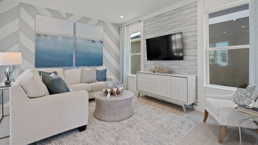Trinity Place Staged Model Ambersweet Living Area by DRB Homes in Saint Cloud FL Trinity Place Staged Model Ambersweet Living Area by DRB Homes in Saint Cloud FL