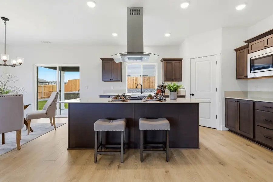 Furnished interior in a model home at Rosengarth Estates in Bend (Image 23).