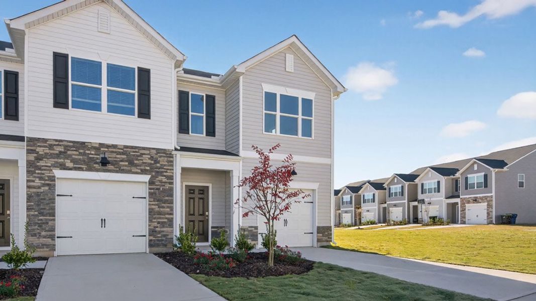 Front exterior of a home in the The Townes at Galvins Ridge community, located in Sanford, NC (Image 13).