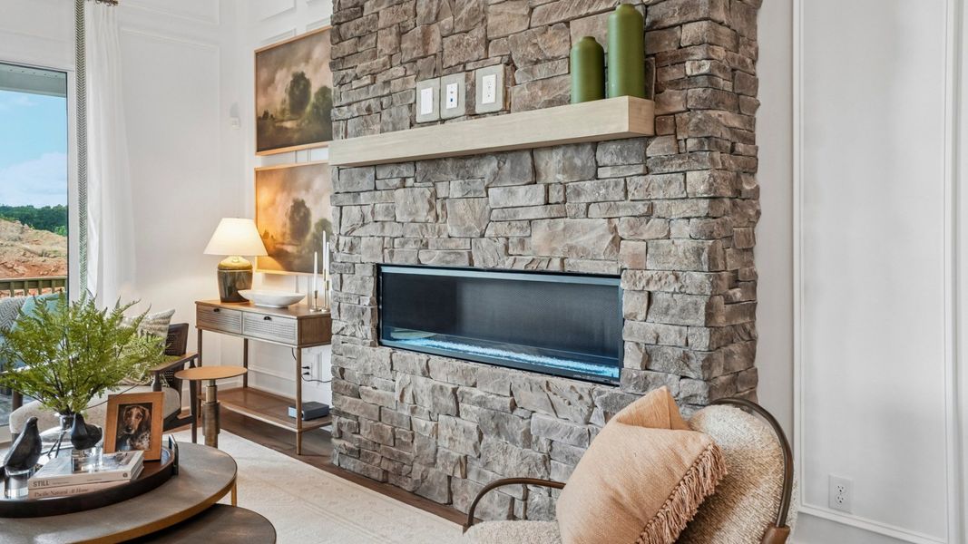 Close-up of gathering room with focus on the brick fireplace