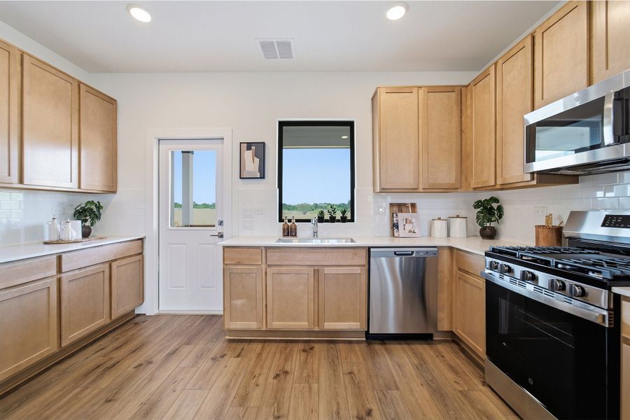 Furnished interior in a model home at Lone Oak in San Antonio (Image 22).